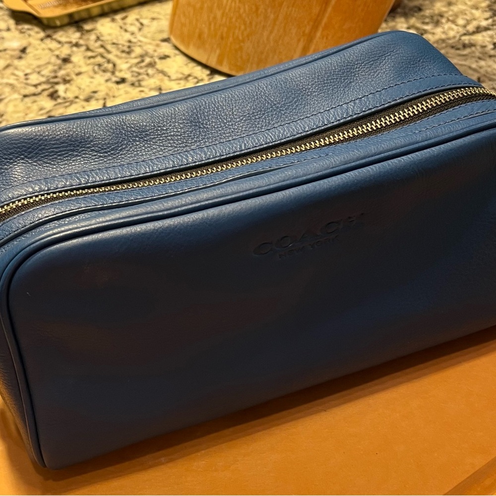 Coach blue leather toiletry bag